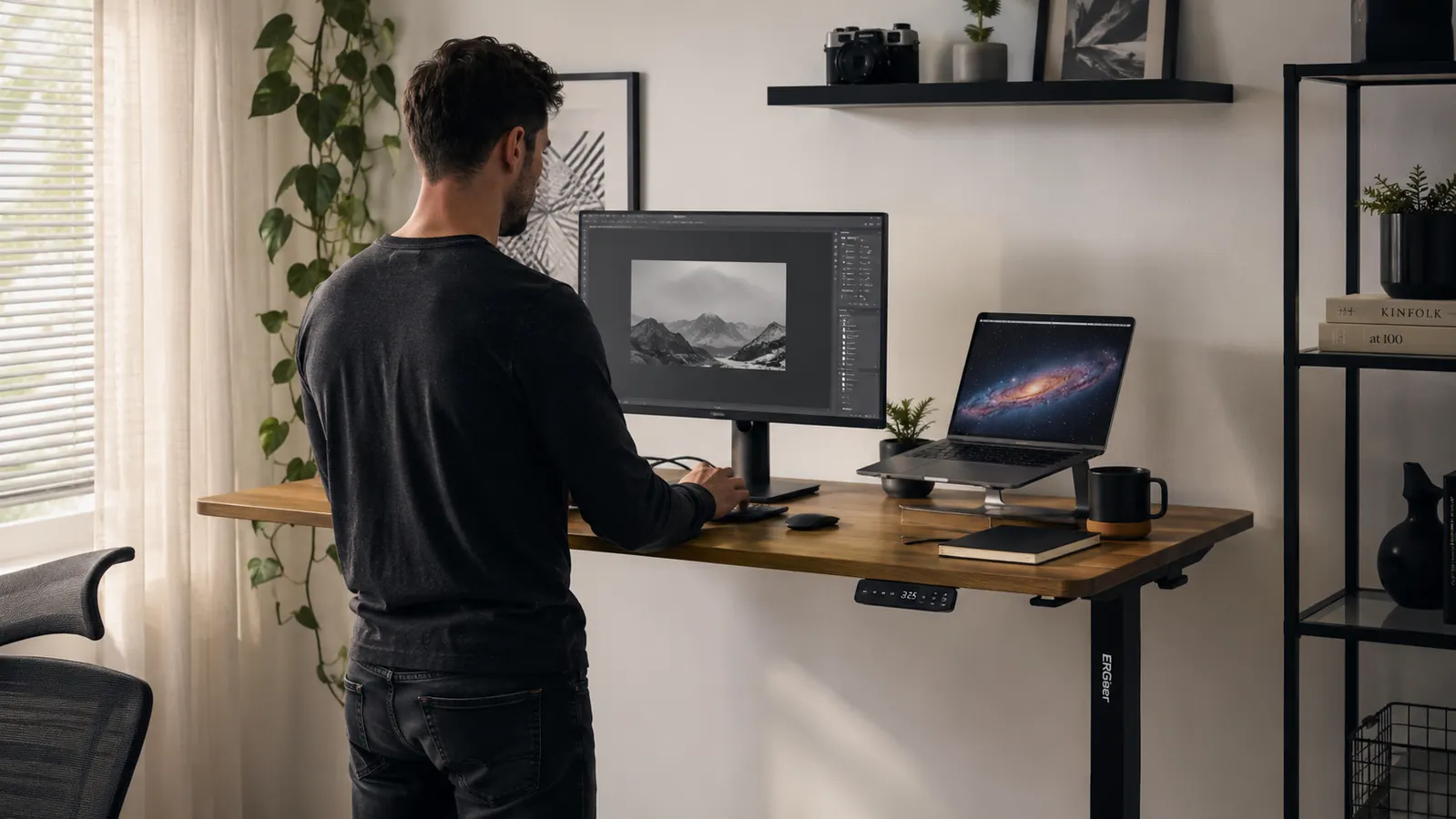 ErGear electric standing desk in a clean home office with a laptop, monitor, and desk accessories in a well-lit room